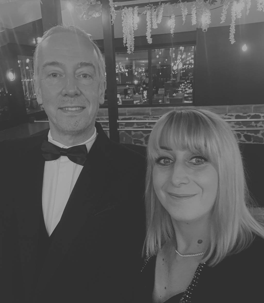 Donna-and-Tim-1-muted-black-and-white